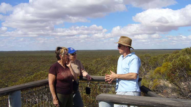 05-Joy & Sue (Gumnut) discuss the park with Trip Leader Laurie