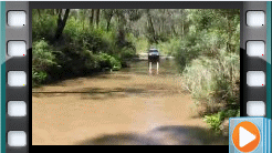 06-Hoppy creates waves in Ben Cruachan Creek