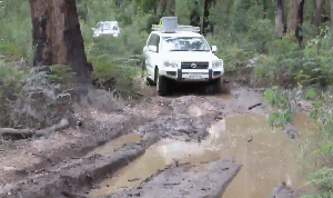 03-Demon cuts thru the mud on Tomboon Track