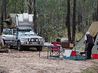 Rosalie puts the last touches to setting up camp