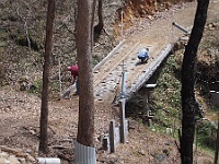 Slawko & Rebecca work hard to clean up the low bridge