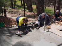 Rob, Greg & Mark smooth off the concrete while Neil watches on