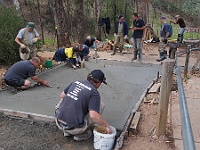 The smoothing of the concrete begins