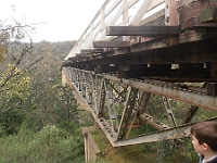 Alex looks down the Snowy River from under McKillops Bridge