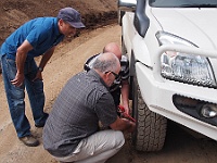Gerry gives Colin some help with his air deflators while Attillio watches on